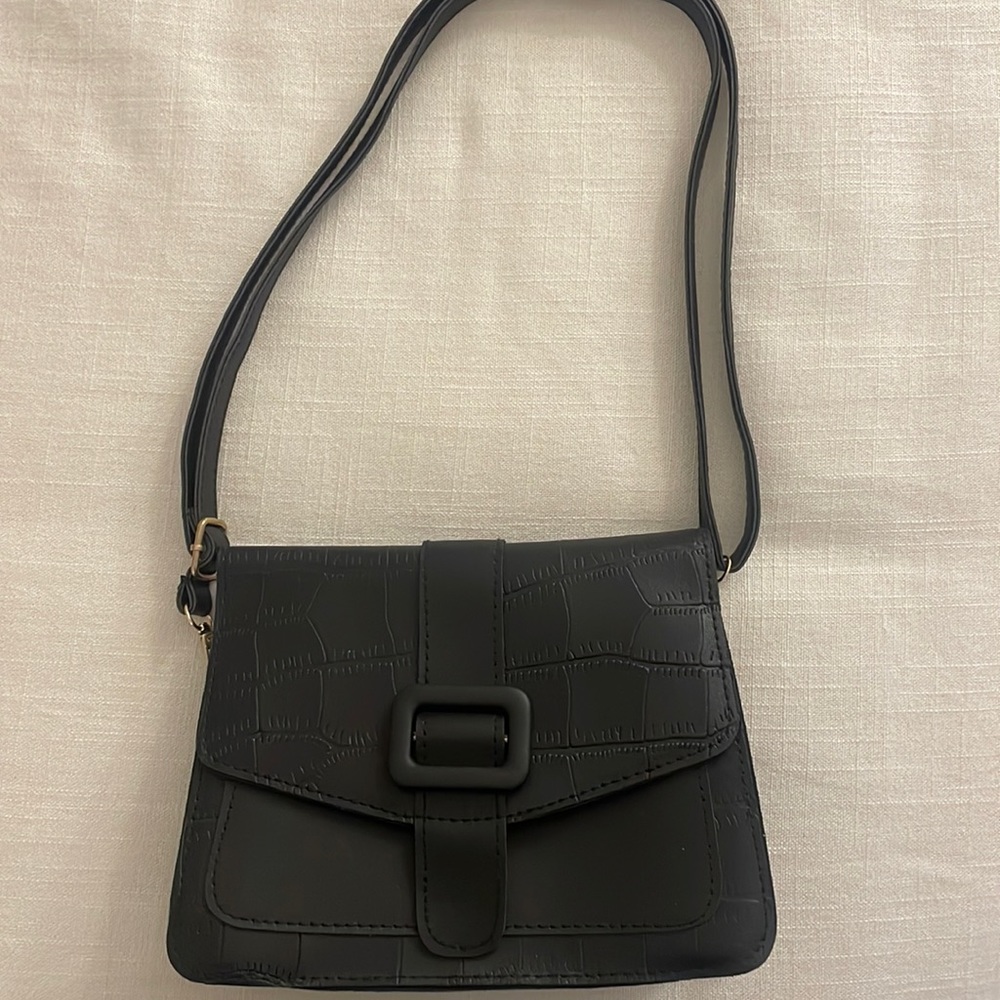 Black embossed crossbody bag